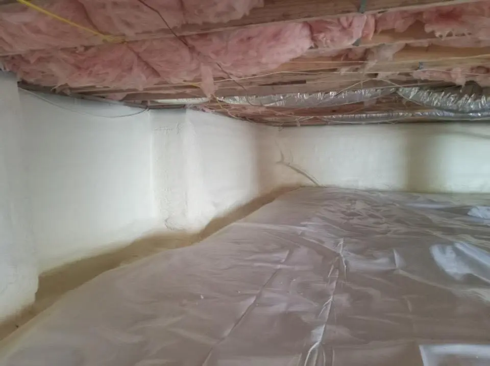 Crawl space encapsulation with closed-cell spray foam for Roof Waterproofing in Fargo